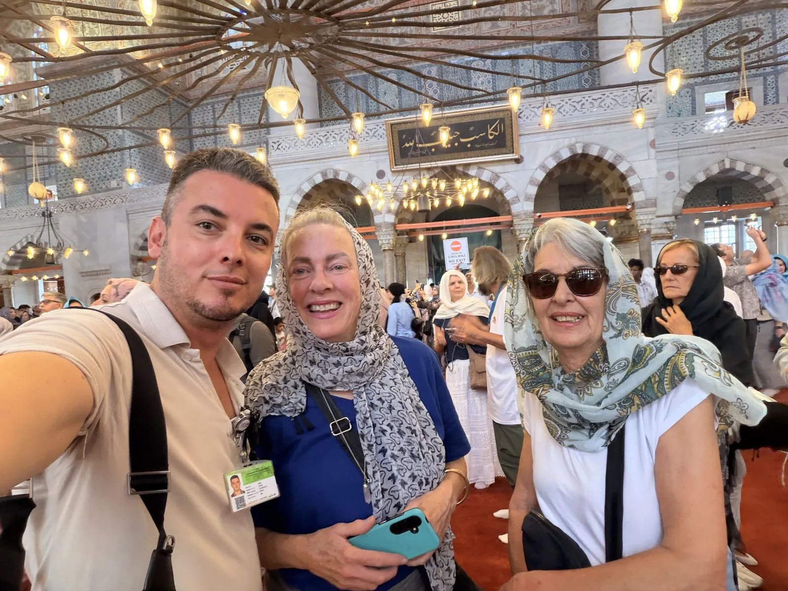 Licensed Istanbul guide Akın Güzel with two guests inside the Blue Mosque (Sultanahmet Mosque)