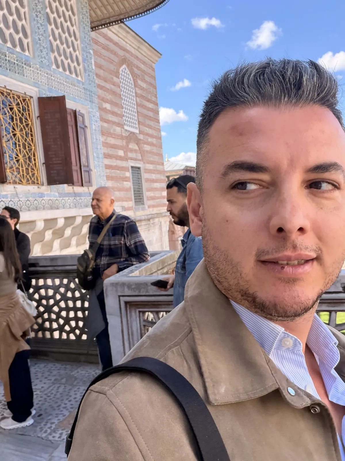 Guide Akın Güzel on the tiled terrace of the Topkapı Palace Harem, Istanbul